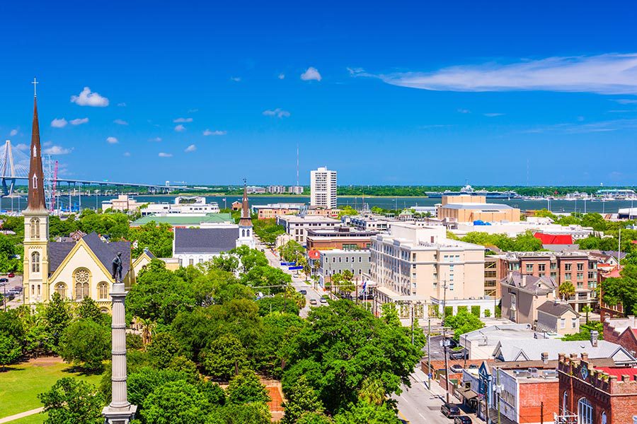 Contact - Aerial View of Charleston, South Carolina Skyline Over Marion Square During a Sunny Day